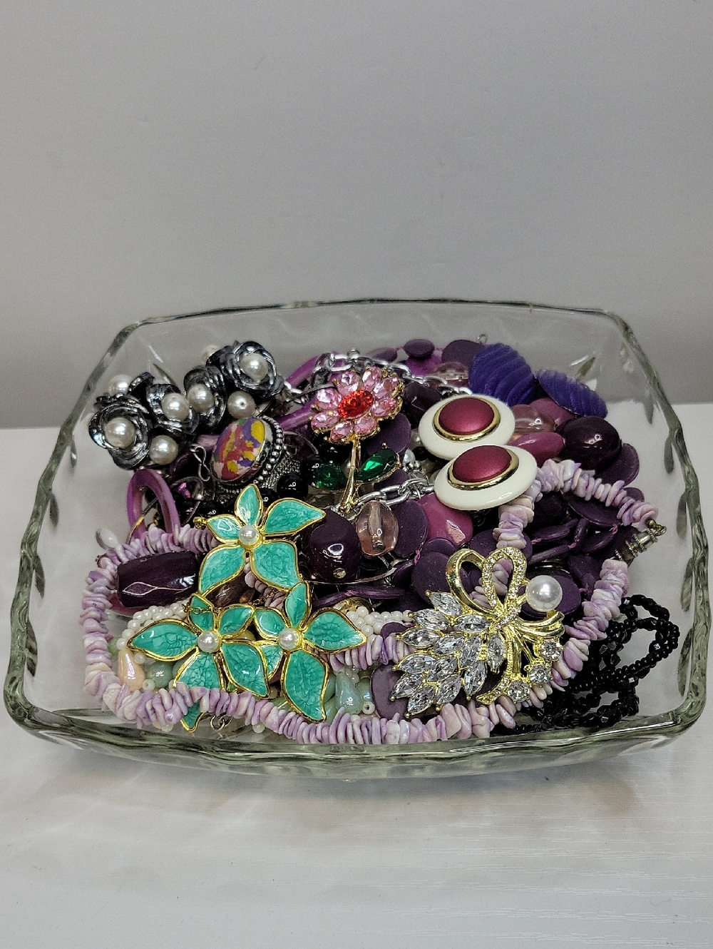 Glass Dish Filled With Jewelry